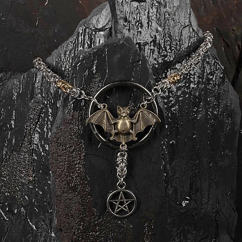 Vespertine, brass bat and pentagram on mixed-metal Byzantine chain